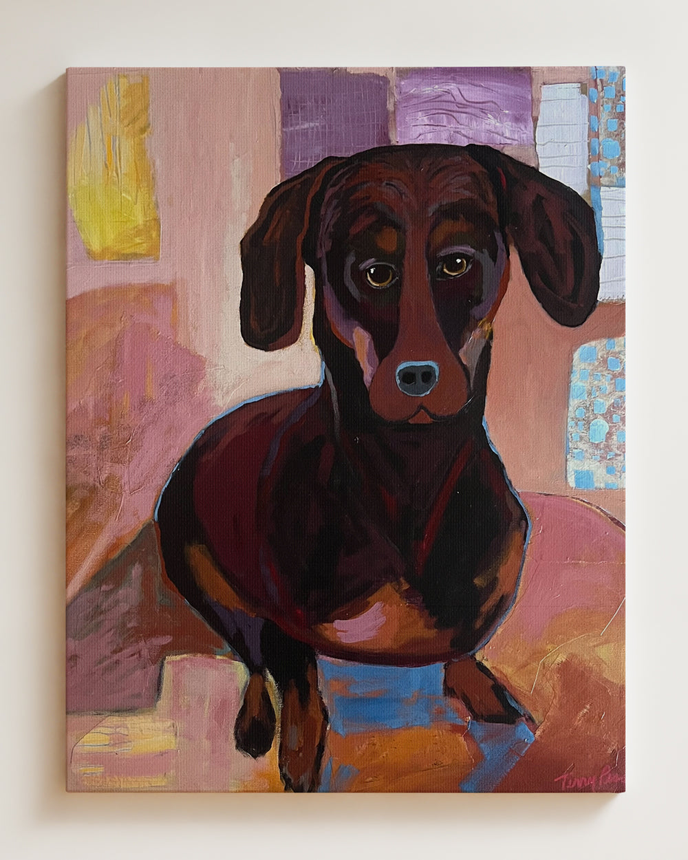 Painting of a dachshund with abstract colorful background. "Bella" is an original mixed media painting that captures the warmth and personality of a Dachshund in expressive, painterly detail. Layers of rose, amber, and deep brown create depth and character, while soft highlights bring the dogÕs soulful eyes to life. The mix of color and texture adds a contemporary edge to a classic portrait, making this a standout piece for dog lovers and modern art collectors alike.