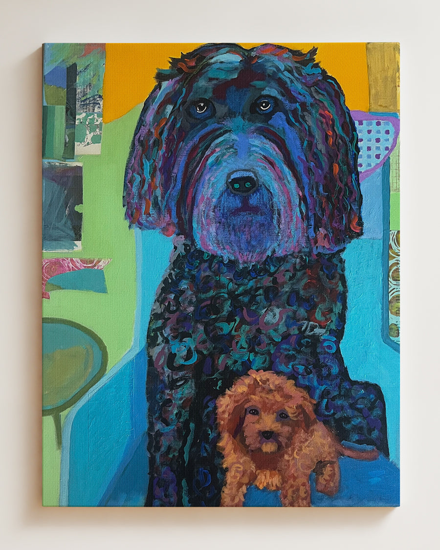 Colorful painting of two dogs in a room with abstract art. Full view, hanging on wall. "I'm Not Sharing" is an original mixed media painting featuring two dogs Ñ a large Labradoodle and a playful Toy Poodle — captured in expressive color and texture. Bold strokes of turquoise, indigo, and orange create a lively, layered portrait full of personality. The piece blends humor and affection, celebrating the charm, curiosity, and loyal companionship of dogs in everyday life. A joyful original artwork for dog love