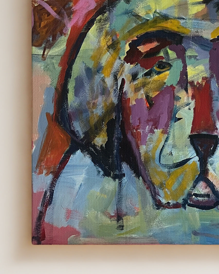 Abstract painting with vibrant colors. Close-up detail shot. "I'm With You" is an original acrylic painting that captures the soulful presence of a dog through bold color and expressive brushwork. Layers of gold, violet, and coral blend together in a composition that feels both modern and deeply emotional. This original artwork celebrates the quiet bond, warmth, and companionship that dogs bring into our lives.