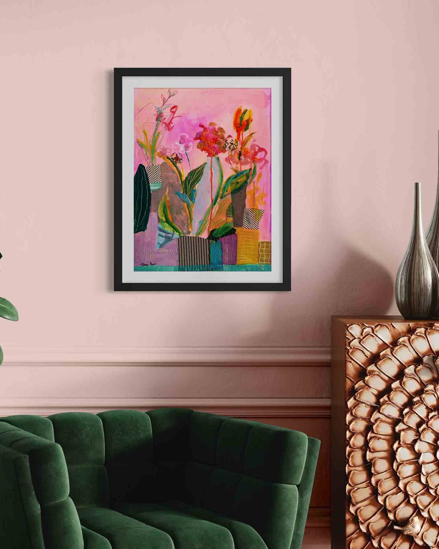 Framed colorful abstract art piece on a pink wall above a green sofa. Lifestyle mockup. Shop original floral and botanical artwork and contemporary painting by Terry Pesso inspired by blooms, leaves, and organic form. These vibrant mixed media paintings bring fresh energy to wall art decor and are ready for framed art and framed wall art display.