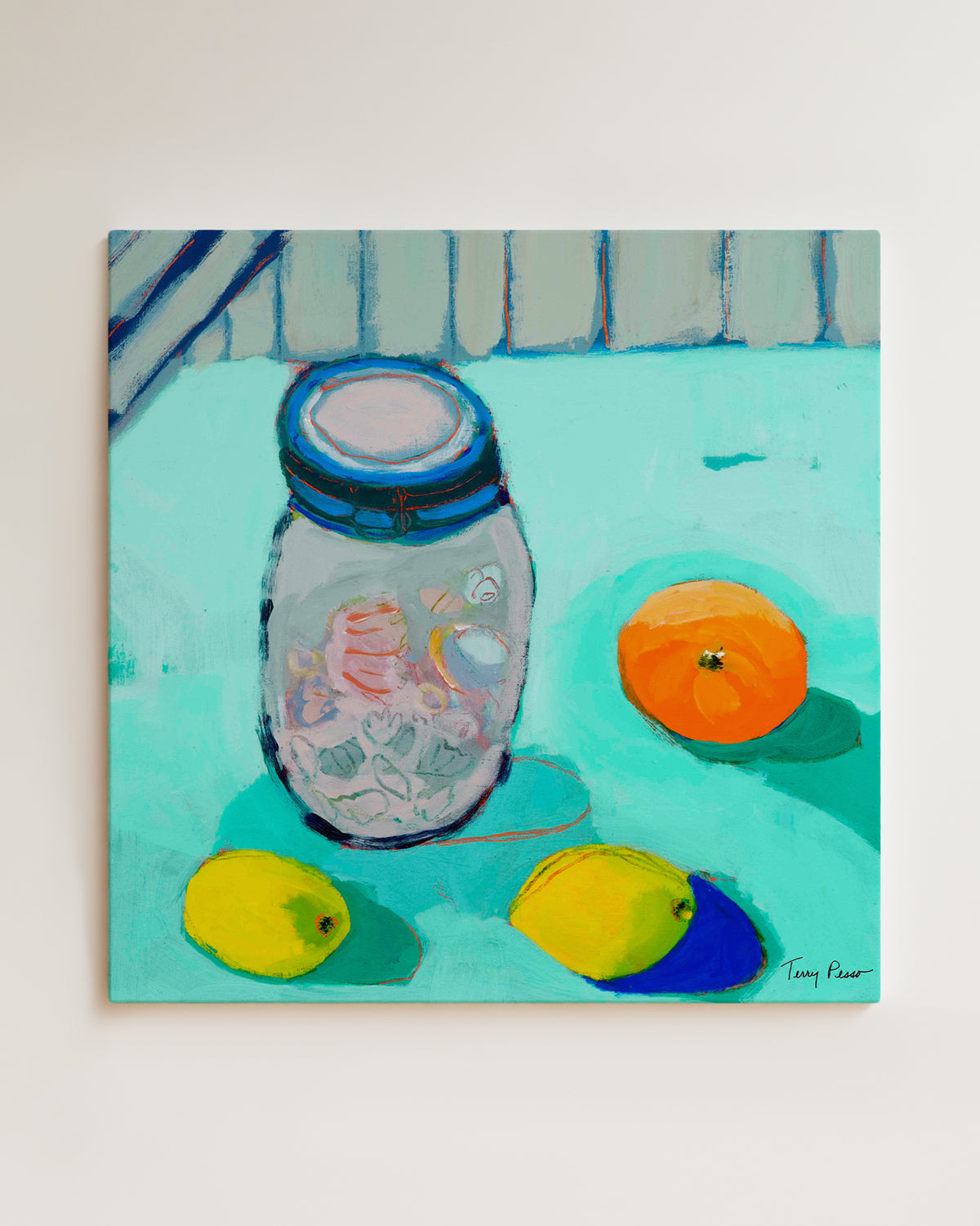 Painting of a jar with lemons and an orange on a light blue surface hanging on wall view. An original still life artwork and contemporary painting by Terry Pesso inspired by everyday objects, vessels, and quiet moments. These expressive works elevate ordinary subjects into refined wall art decor and are suitable for framed art and framed wall art.